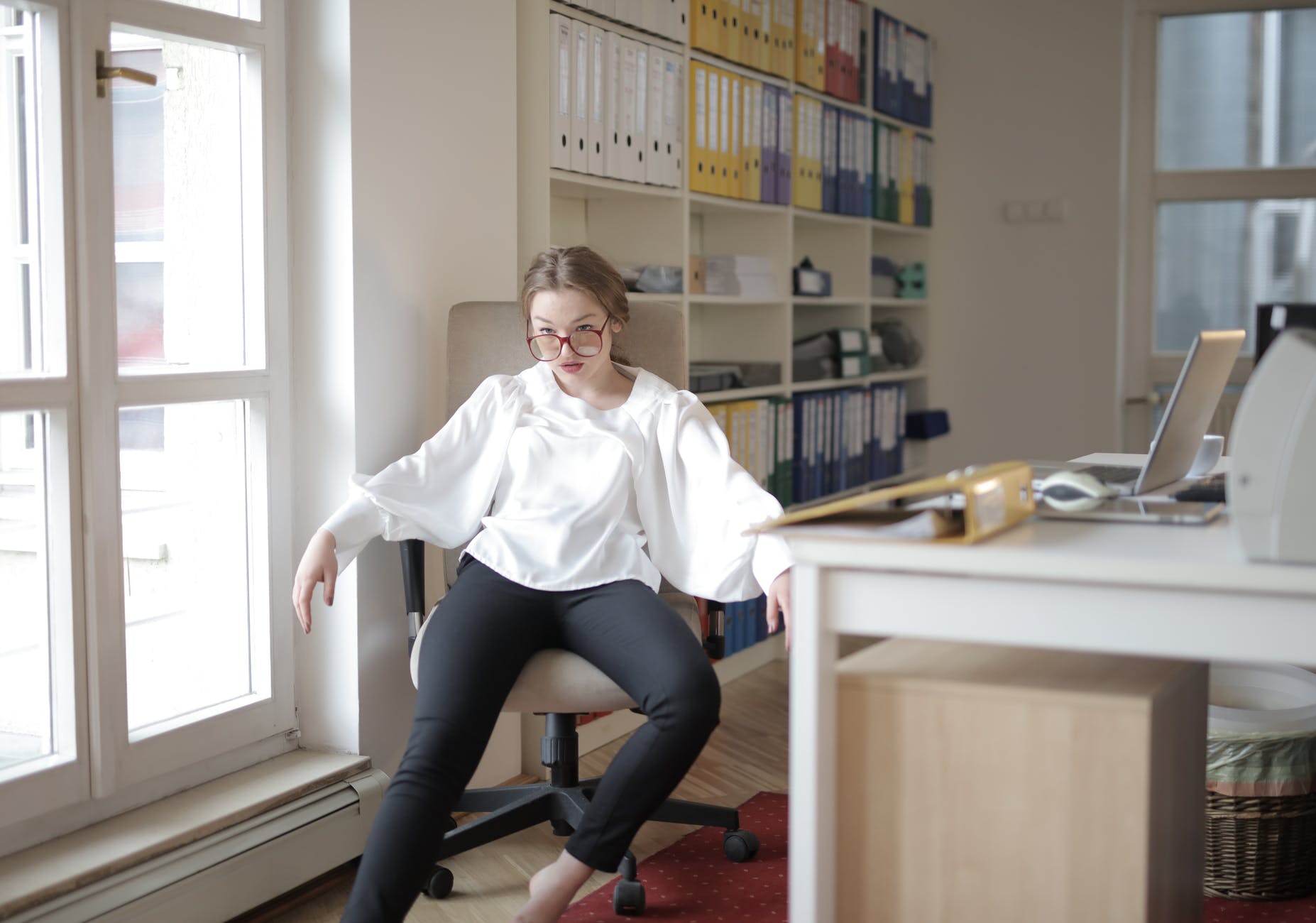 arrogant female worker showing disrespect in office